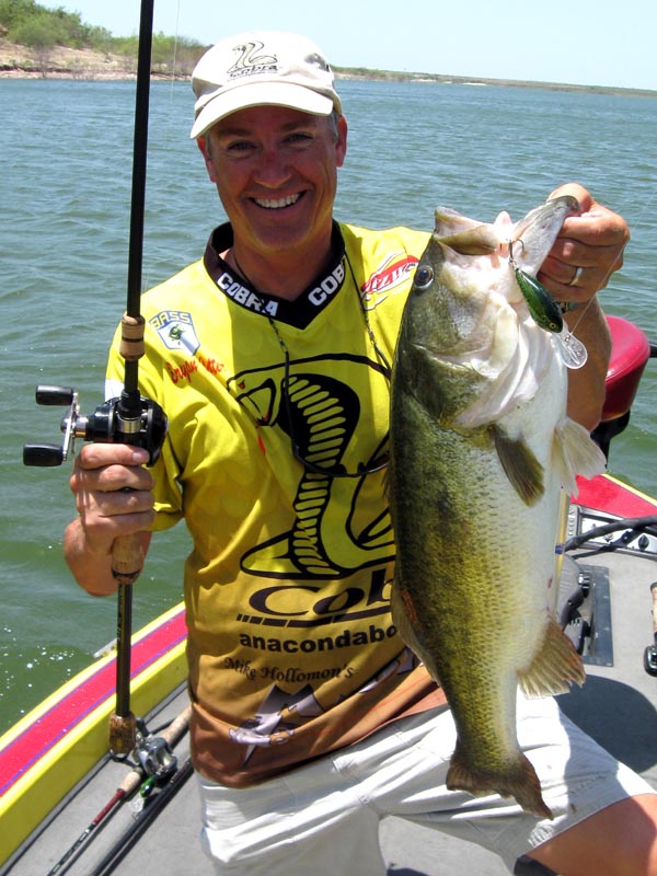Angler with a Lake Falcon largemouth bass, July 2009