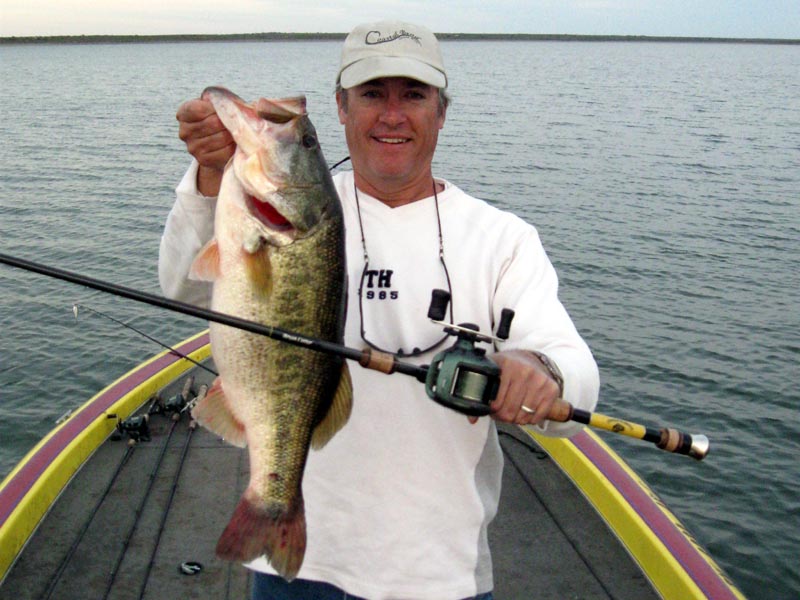 Angler with a Lake Falcon largemouth on a Christmas trip, December 2009